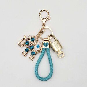 Authentic Louis Vuitton Lock & Key with unbranded Elephant Bagcharm, Keycharm